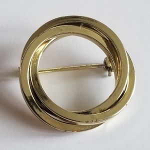 Vintage open circle brooch with two interlocking circles  Gold tone metal